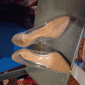 JLO clear high heel shoes